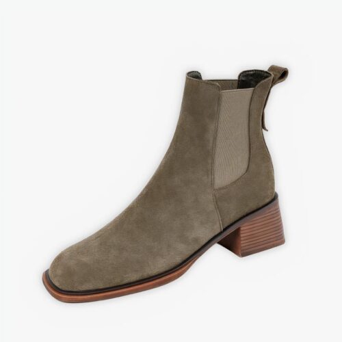 Boots santiag rétro en suède pour femme sur fond gris