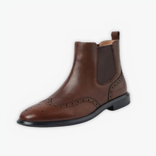 Boots santiag vintage en cuir sur fond gris