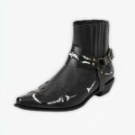 Bottines homme santiag noires élégantes et modernes sur fond gris