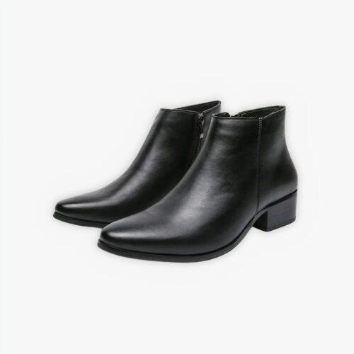 Chaussure homme santiag noire avec fermeture éclair sur fond gris