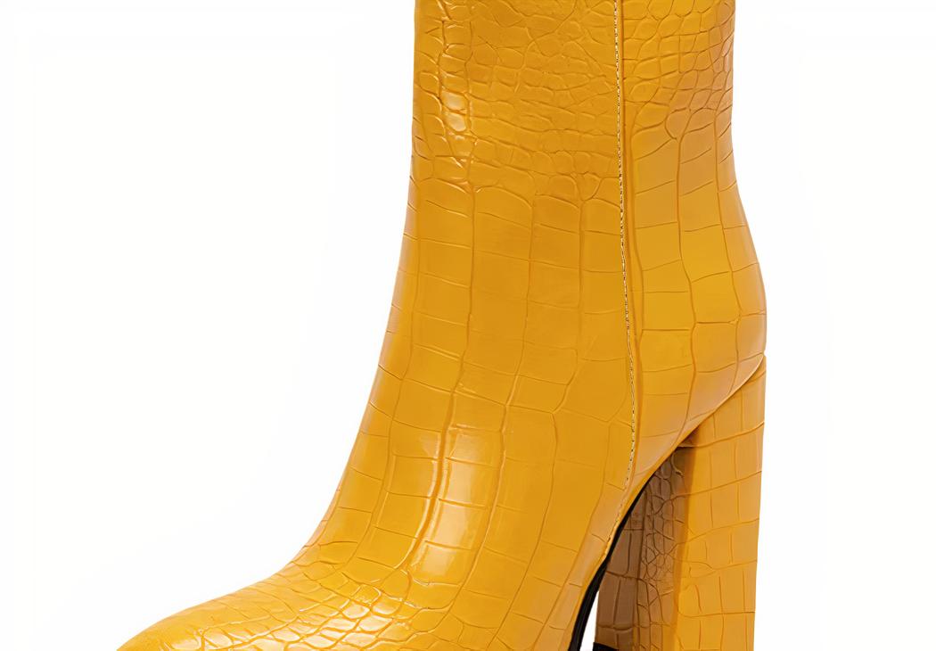 Santiag croco jaune à fermeture éclair sur fond blanc