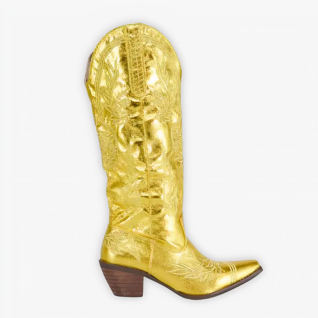 Santiag dorée lumineuse avec détails brodés sur fond gris