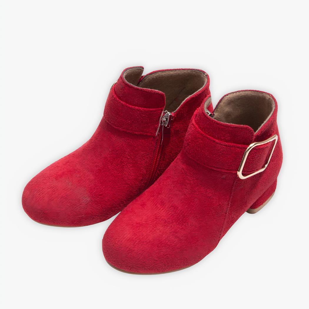 Santiag enfant moderne et élégante sur fond gris