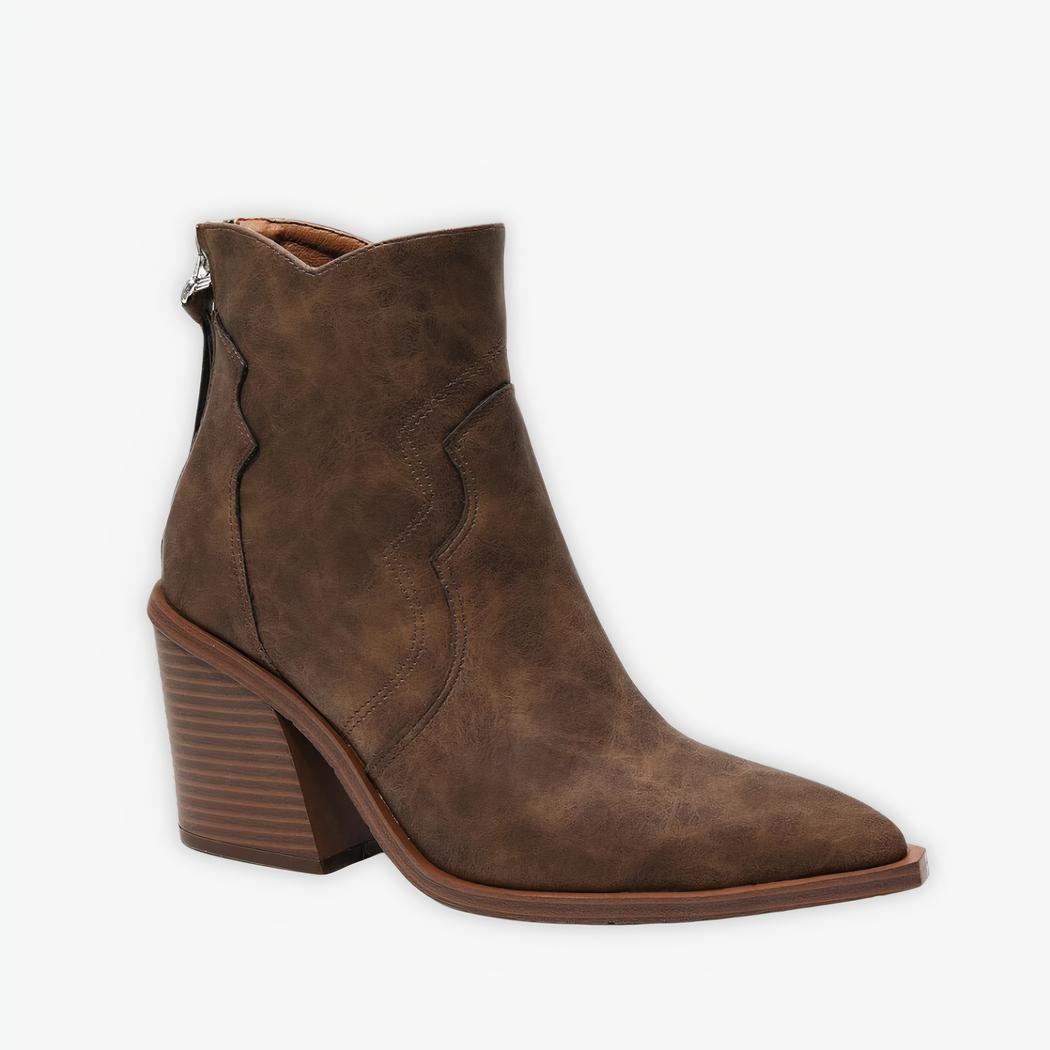 Santiag marron et vintage pour femme sur fond gris