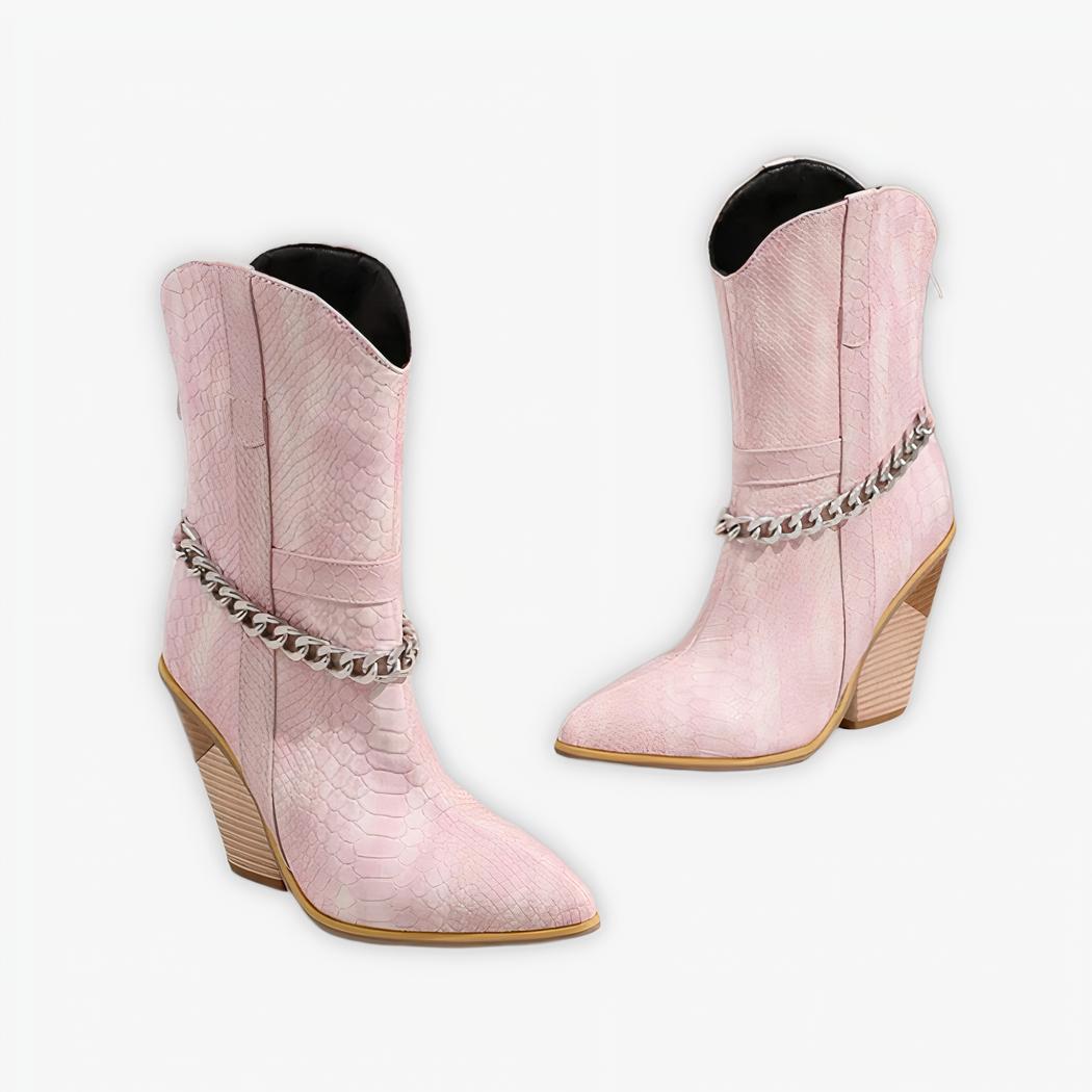 Santiag rose rétro à talon avec chaînette décorative sur fond gris